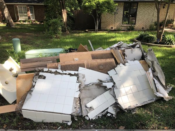 Debris pile: bathroom demolition remnants.
